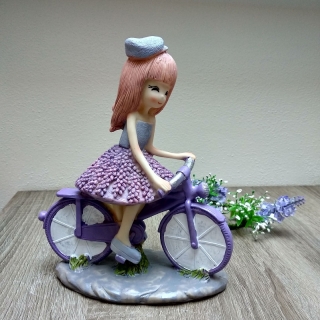 Jarná dekorácia dievčatko s bicyklom 20 cm